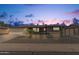 Charming single-story brick home featuring a two-car garage and low maintenance desert landscaping at 6722 E El Paso St, Mesa, AZ 85205