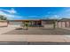 Charming brick home exterior with a well-manicured gravel yard at 6722 E El Paso St, Mesa, AZ 85205