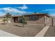 Home's exterior is brick with tidy desert landscaping at 6722 E El Paso St, Mesa, AZ 85205