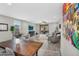 Open concept living and dining area with plenty of natural light and access to the backyard at 7070 W Andrea Dr, Peoria, AZ 85383