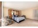 Spacious bedroom with a comfortable bed and large closet at 7252 E Edgewood Ave, Mesa, AZ 85208