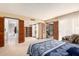 Bright and spacious bedroom with views to bathroom and lounge at 7252 E Edgewood Ave, Mesa, AZ 85208