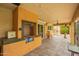Covered patio featuring an outdoor grill, a built-in bar and tile flooring at 7252 E Edgewood Ave, Mesa, AZ 85208