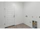 Mud room featuring a wood-look tile floor and a white door for easy access to the outside at 7342 W Hedge Hog Pl, Peoria, AZ 85383