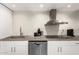 Close-up of modern kitchen featuring stainless steel appliances and sleek, minimalist countertops at 7740 E Heatherbrae Ave # 13, Scottsdale, AZ 85251