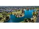 Beautiful aerial view of the property near a lake and lush green park at 8113 E Vista Dr, Scottsdale, AZ 85250