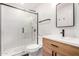 Updated bathroom featuring a glass shower, modern fixtures, and a vanity at 8113 E Vista Dr, Scottsdale, AZ 85250