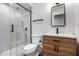 Remodeled bathroom with sleek fixtures, glass shower, and modern vanity at 8113 E Vista Dr, Scottsdale, AZ 85250