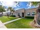 Charming single-story home with a well-manicured front lawn and mature trees at 8113 E Vista Dr, Scottsdale, AZ 85250