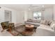 Bright living room features a comfortable sectional couch and lots of natural light at 8113 E Vista Dr, Scottsdale, AZ 85250