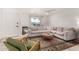 Comfortable living room features neutral tones and stylish wood accent table at 8113 E Vista Dr, Scottsdale, AZ 85250