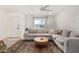 Cozy living room boasts a large sectional and natural light with a stylish rug at 8113 E Vista Dr, Scottsdale, AZ 85250