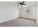 Bedroom with ceiling fan, and a window with blinds at 8132 W Earll Dr, Phoenix, AZ 85033