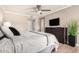 Bedroom featuring a full-length mirror, a TV and sleek dresser at 8250 E Arabian Trl # 120, Scottsdale, AZ 85258