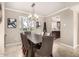 Stylish dining room with a view to the kitchen at 8250 E Arabian Trl # 120, Scottsdale, AZ 85258