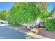 Quaint home with mature trees, carport, and well-kept landscaping at 111 S Greenfield Rd # 670, Mesa, AZ 85206