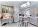 Well-lit kitchen with an eating area and ample cabinet space at 111 S Greenfield Rd # 670, Mesa, AZ 85206