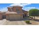 Charming two-story home featuring a two-car garage, landscaped yard, and a well-maintained exterior at 11183 W Tonto St, Avondale, AZ 85323