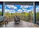 Serene balcony with comfortable seating and stunning views of the desert landscape at 11935 E Casitas Del Rio Dr, Scottsdale, AZ 85255