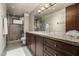 This primary bathroom features a walk-in shower and granite countertops at 11935 E Casitas Del Rio Dr, Scottsdale, AZ 85255