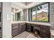 Bathroom features dual sinks, granite vanity with ample counter space, and mountain views at 11935 E Casitas Del Rio Dr, Scottsdale, AZ 85255