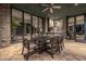 Expansive covered patio featuring an outdoor dining area and sliding glass doors at 11935 E Casitas Del Rio Dr, Scottsdale, AZ 85255