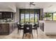 Dining area with modern furnishings and access to outdoor patio at 11935 E Casitas Del Rio Dr, Scottsdale, AZ 85255