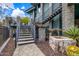 Landscaped walkway and staircase complemented by elegant water features at 11935 E Casitas Del Rio Dr, Scottsdale, AZ 85255