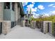 Striking exterior with stone accents and multi-level decks at 11935 E Casitas Del Rio Dr, Scottsdale, AZ 85255