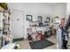 Organized garage space with shelving, storage, and exterior access at 11935 E Casitas Del Rio Dr, Scottsdale, AZ 85255
