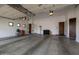 Spacious garage with ample room for storage, multiple access doors and good lighting at 11935 E Casitas Del Rio Dr, Scottsdale, AZ 85255