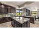 Kitchen with granite countertops, stainless appliances and stone backsplash at 11935 E Casitas Del Rio Dr, Scottsdale, AZ 85255