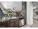Gourmet kitchen area with granite countertops, stainless steel appliances, and custom cabinetry at 11935 E Casitas Del Rio Dr, Scottsdale, AZ 85255