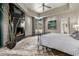 Spacious main bedroom featuring a fireplace, desert views, and a plush bed for ultimate comfort at 11935 E Casitas Del Rio Dr, Scottsdale, AZ 85255