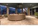 Covered patio with comfortable wicker seating offers a relaxing outdoor space at 11935 E Casitas Del Rio Dr, Scottsdale, AZ 85255