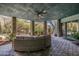 Expansive covered patio features decorative stone and views of the surrounding landscape at 11935 E Casitas Del Rio Dr, Scottsdale, AZ 85255