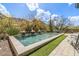 Sparkling pool features fire bowls and views of the surrounding desert landscape at 11935 E Casitas Del Rio Dr, Scottsdale, AZ 85255