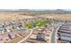 Picturesque aerial shot of the neighborhood, highlighting manicured green spaces, and beautifully designed single-Gathering homes at 1316 E Spencer St, Casa Grande, AZ 85122