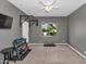 Multi-purpose room with weights, pull-up bar, and large window offering great natural light at 1405 W Caribbean Ln, Phoenix, AZ 85023
