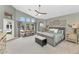 Bright and airy primary bedroom with vaulted ceilings and views of the pool and outdoor space at 1405 W Caribbean Ln, Phoenix, AZ 85023
