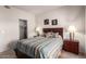 Comfortable bedroom features a large closet and side tables with lamps at 14145 N 92Nd St # 1158, Scottsdale, AZ 85260