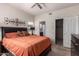 Comfortable bedroom showcasing closet and bathroom entrances at 14145 N 92Nd St # 1158, Scottsdale, AZ 85260
