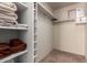 Walk-in closet with shelves and storage for organization at 14145 N 92Nd St # 1158, Scottsdale, AZ 85260