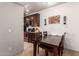 Dining area featuring dark wooden furniture and neutral walls at 14145 N 92Nd St # 1158, Scottsdale, AZ 85260