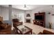 Comfortable living room featuring tile flooring, neutral walls, with a fireplace at 14145 N 92Nd St # 1158, Scottsdale, AZ 85260