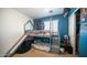Fun ' bedroom featuring a unique bunk bed with a slide and playful decor at 15024 N 142Nd Ln, Surprise, AZ 85379