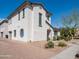 Charming two-story home with low maintenance landscaping and brick paver driveway at 15024 N 142Nd Ln, Surprise, AZ 85379