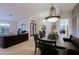Spacious dining area with designer lighting, perfect for entertaining guests and Gathering gatherings at 15954 W Sheila Ln, Goodyear, AZ 85395