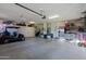 Spacious garage with ample storage cabinets, and room for car, tools, and recreational vehicles at 15954 W Sheila Ln, Goodyear, AZ 85395