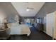 Expansive main bedroom features neutral decor, a sitting area, and access to the outdoors at 15954 W Sheila Ln, Goodyear, AZ 85395